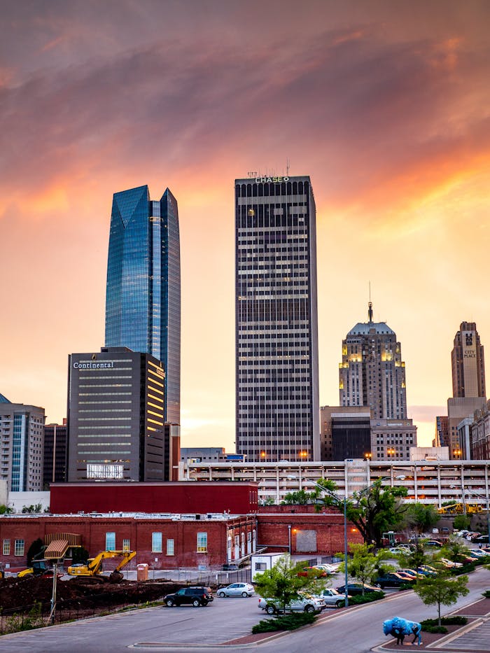 Stunning skyline view of Oklahoma City with dramatic sunset colors